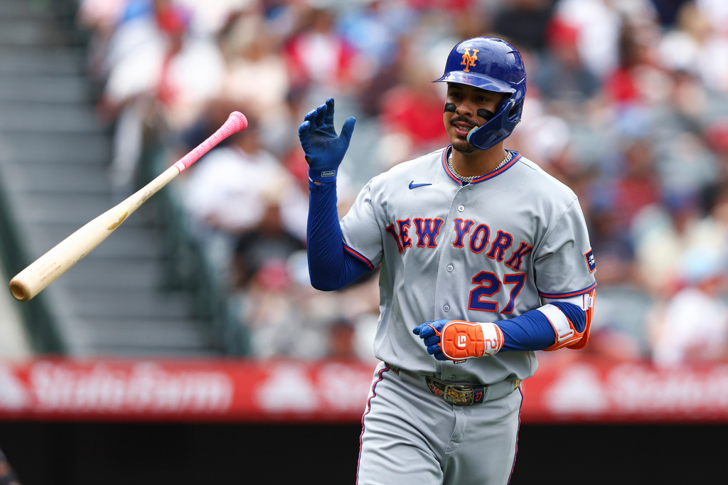 New York Mets' Mark Vientos tosses his bat after hitting a home run during the fourth inning of a baseball game against the Los Angeles Angels, Sunday, May 3, 2026, in Anaheim, Calif. (AP Photo/Jessie Alcheh)