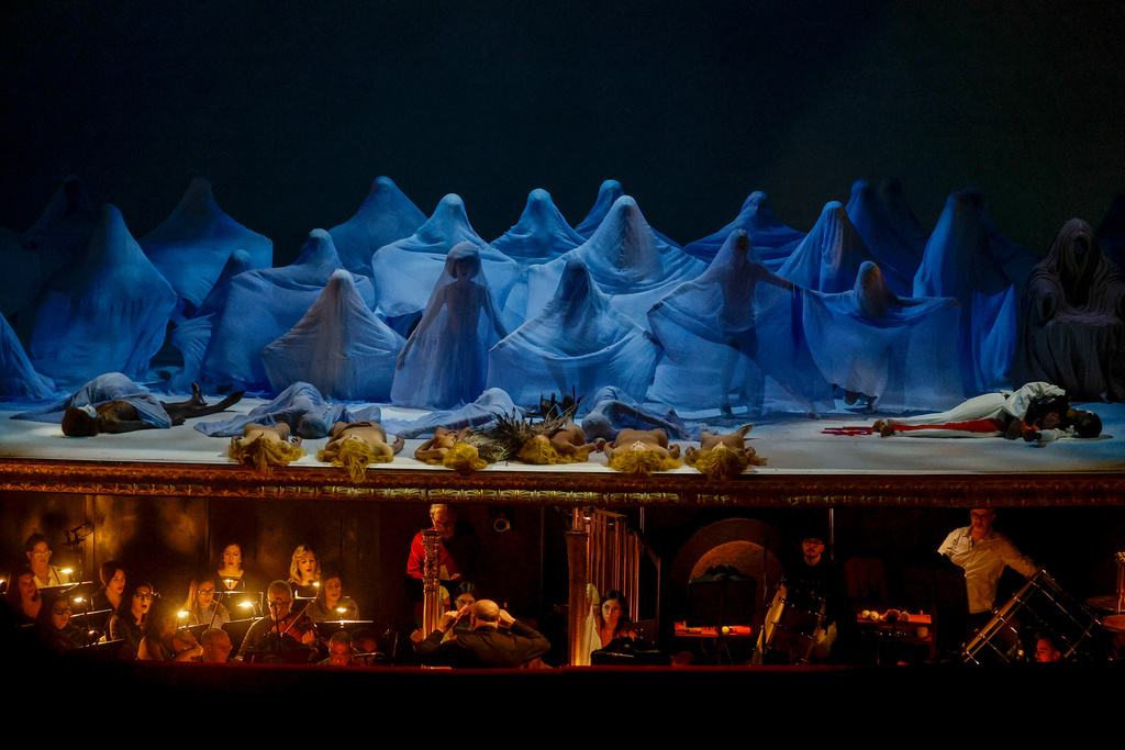 Actors perform during the general rehearsal of Ennio Morricone's only opera, Partenope, at the San Carlo Theatre, in Naples, Italy, Thursday, Dec. 11, 2025. (AP Photo/Salvatore Laporta)