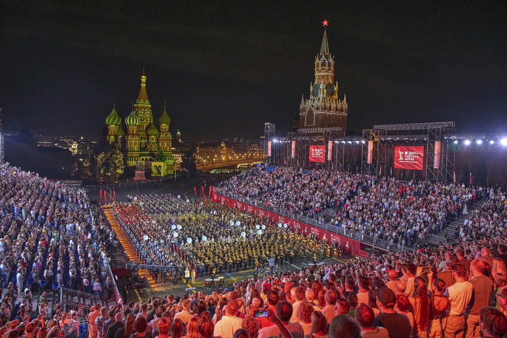 A combined military band of the participating countries performs during the closing ceremony of the Spasskaya Tower International Military Music Festival in Red Square in front of the St. Basil Cathedral in Moscow, Russia, on Sunday, Aug. 31, 2025. (AP Photo/Alexander Zemlianichenko)