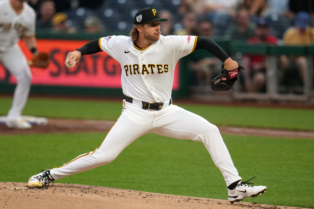 Pittsburgh Pirates pitcher Carmen Mlodzinski delivers during the second inning of a baseball game against the Washington Nationals in Pittsburgh, Wednesday, April 15, 2026. (AP Photo/Gene J. Puskar)