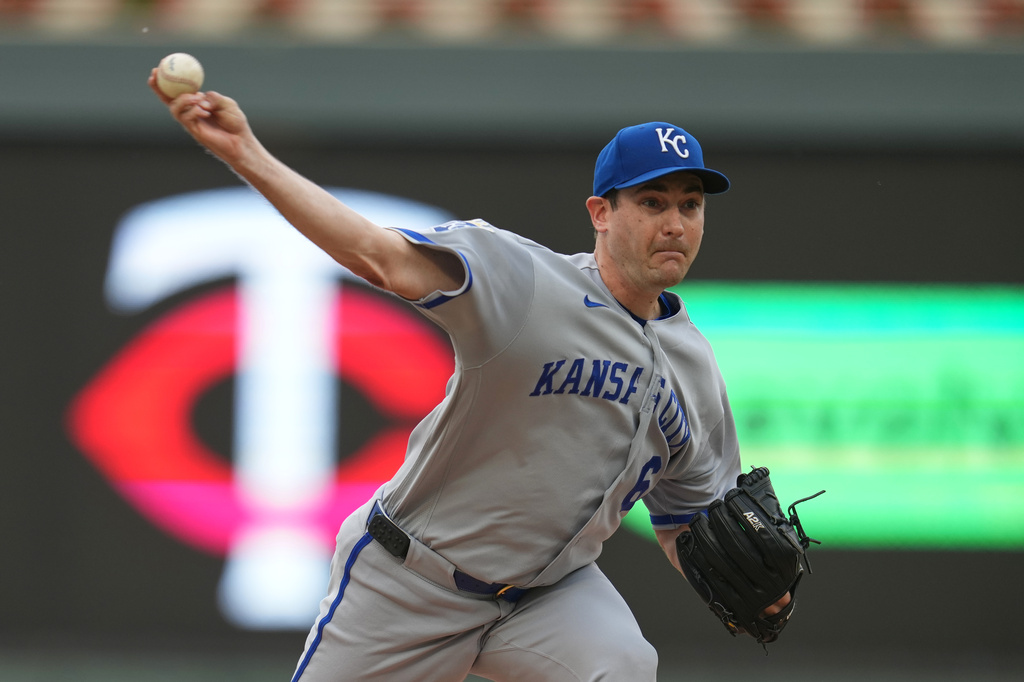 Kansas City Royals starting pitcher Seth Lugo delivers during the first inning of a baseball game against the Minnesota Twins, Thursday, June 4, 2026, in Minneapolis. (AP Photo/Abbie Parr)