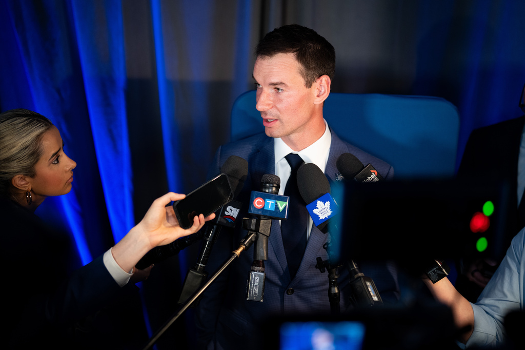 FILE - New Toronto Maple Leafs General Manager John Chayka speaks during a scrum following a news conference in Toronto, May 4, 2026. (Arlyn McAdorey/The Canadian Press via AP, File)