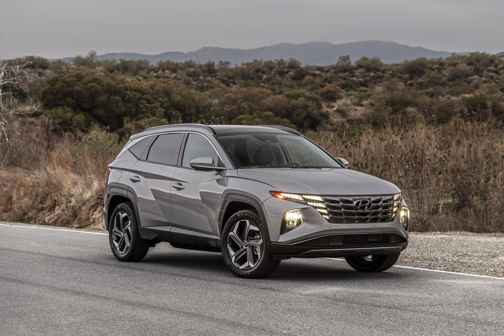 This photo provided by Hyundai shows a 2024 Tucson Plug-in Hybrid. The Tucson Plug-in Hybrid is just like a regular Tucson but with a plug-in hybrid powertrain that can drive more than 30 miles on all-electric power. (Courtesy of Hyundai Motor America via AP)