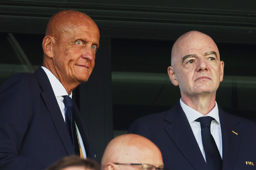 FIFA President Gianni Infantino, right, and former referee Pierluigi Collina attend the opening game of the Women's U20 World Cup opening match between Poland and Argentina in Katowice, Poland, Saturday, Sept. 5, 2026. (AP Photo/Beata Zawrzel) CORRECTION: Corrects spelling of name to Collina not Colina