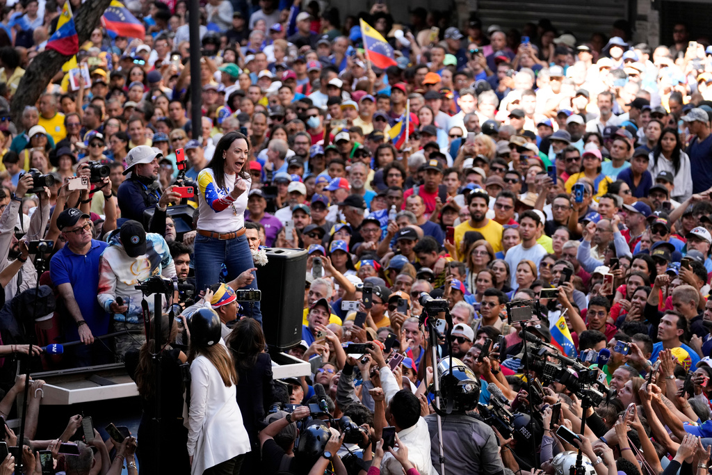 FILE - Opposition leader Maria Corina Machado addresses supporters during a protest against Venezuelan President Nicolas Maduro the day before his inauguration for a third term in Caracas, Venezuela, Thursday, Jan. 9, 2025. (AP Photo/Matias Delacroix, File)