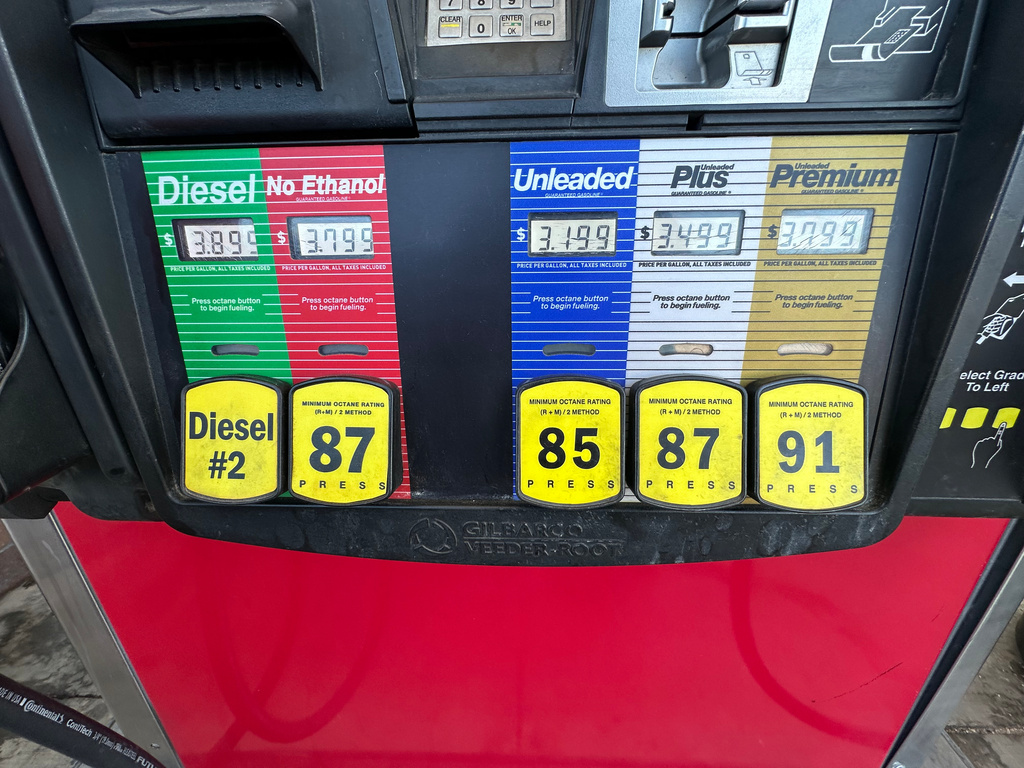 Prices are displayed electronically at a QuikTrip convenience store, Wednesday, March 4, 2026, in Greenwood Village, Colo. (AP Photo/David Zalubowski)