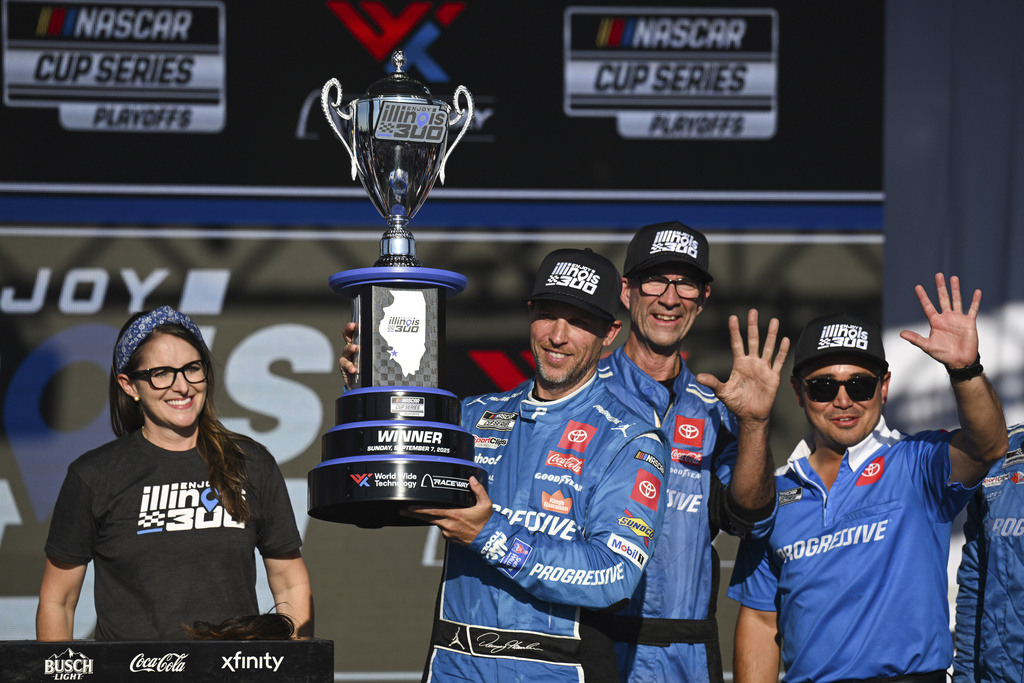 Denny Hamlin, second from left, celebrates after winning a NASCAR Cup Series auto race at World Wide Technology Raceway, Sunday, Sept. 7, 2025, in Madison, Ill. (AP Photo/Connor Hamilton)