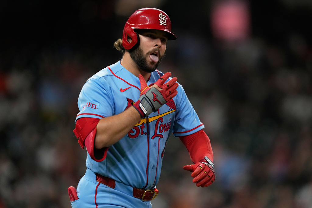 St. Louis Cardinals' Alec Burleson celebrates as he runs the bases after hitting a home run during the seventh inning of a baseball game against the Houston Astros in Houston, Saturday, April 18, 2026. (AP Photo/Ashley Landis)