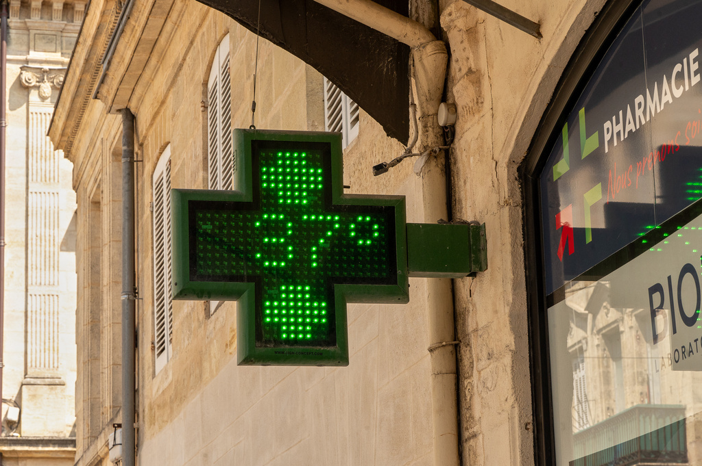 A pharmacy sign displays a temperature of 37 degrees Celsius (98.6 degrees Fahrenheit) in Bordeaux, France, Thursday, Aug. 13, 2026, as a heatwave affects much of the country. (AP Photo/Caroline Blumberg)