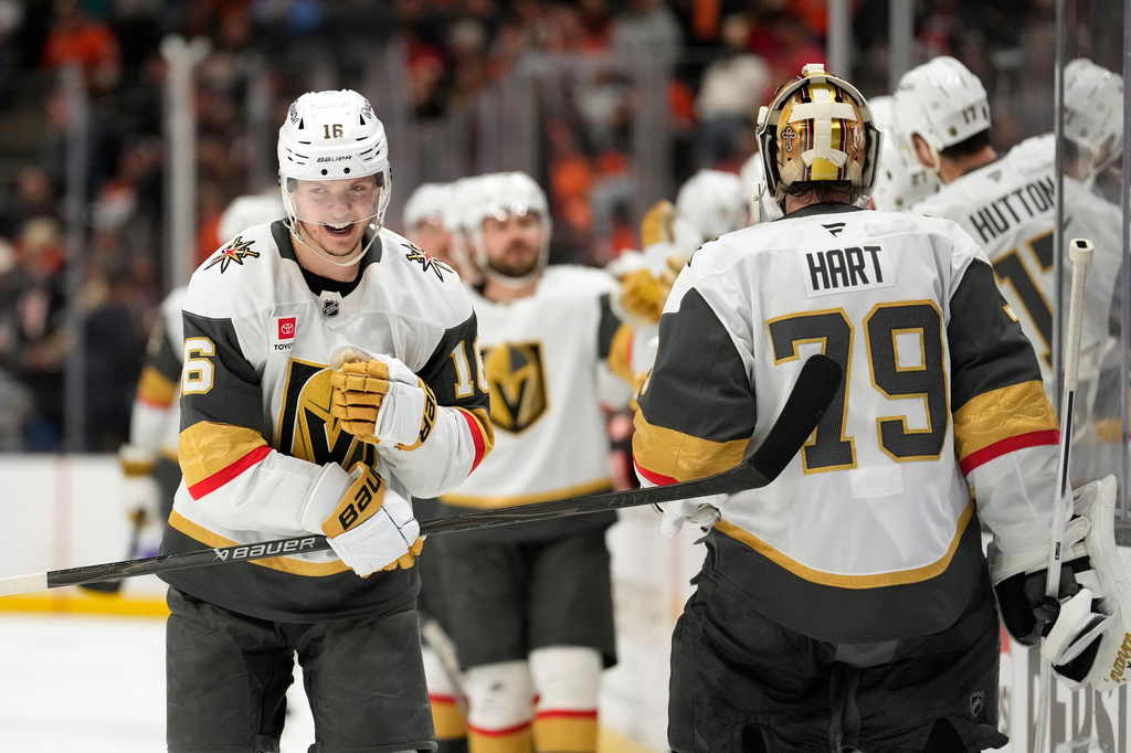 Vegas Golden Knights right wing Pavel Dorofeyev, left, celebrates his goal with goaltender Carter Hart during the third period in Game 6 of a second-round NHL hockey Stanley Cup playoff series against the Anaheim Ducks, Thursday, May 14, 2026, in Anaheim, Calif. (AP Photo/Mark J. Terrill)