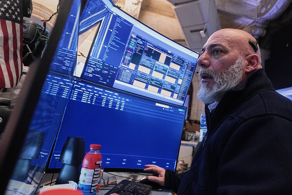 Trader Vincent Napolitano works on the floor of the New York Stock Exchange, Thursday, Jan. 22, 2026. (AP Photo/Richard Drew)