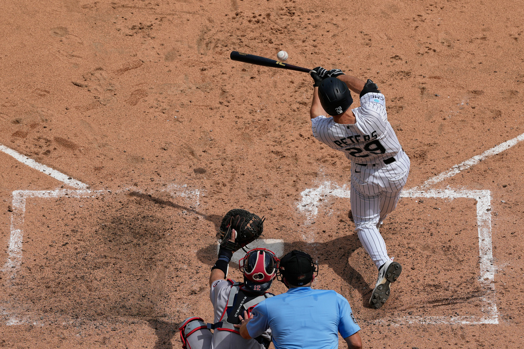 Chicago White Sox's Tristan Peters hits a single during the sixth inning of a baseball game against the Boston Red Sox in Chicago, Thursday, July 9, 2026. (AP Photo/Nam Y. Huh)