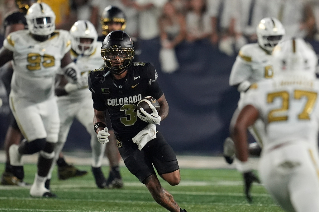 Colorado wide receiver DeAndre Moore Jr. (3) runs against Georgia Tech during the first half of an NCAA college football game, Thursday, Sept. 3, 2026, in Atlanta. (AP Photo/Mike Stewart)