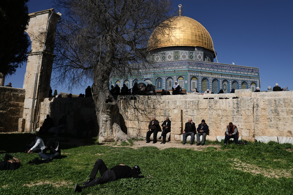 Muslim worshippers gather for prayers on the first Friday of the holy month of Ramadan at the Al-Aqsa Mosque compound in Jerusalem's Old City, Friday, Feb. 20, 2026. (AP Photo/Mahmoud Illean)