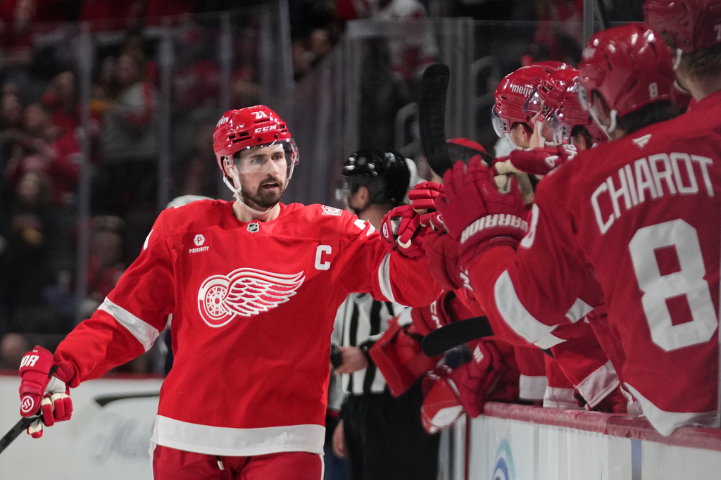FILE - Detroit Red Wings center Dylan Larkin celebrates his goal against the Columbus Blue Jackets in the first period of an NHL hockey game in Detroit, April 7, 2026. (AP Photo/Paul Sancya, File)