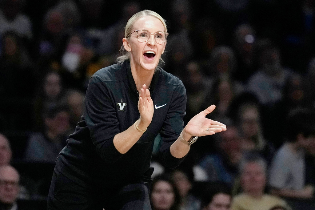 FILE - Vanderbilt head coach Shea Ralph cheers on her players in the first half of an NCAA college basketball game against Alabama, Thursday, Feb. 26, 2026, in Nashville, Tenn. (AP Photo/Mark Humphrey, File)