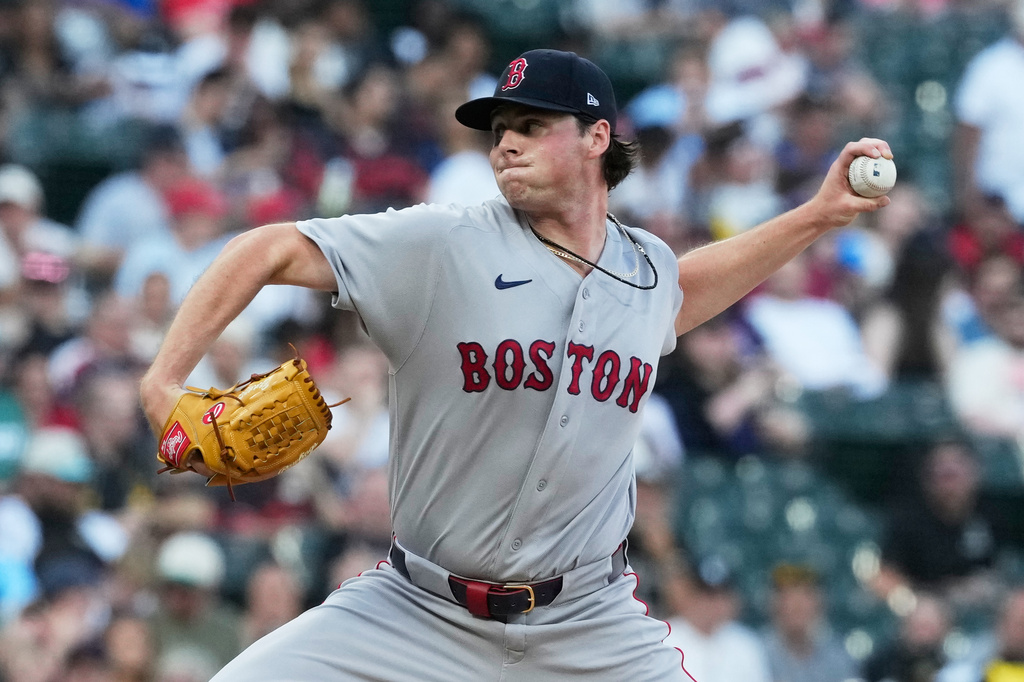 Boston Red Sox starting pitcher Jake Bennett throws against the Chicago White Sox during the first inning of a baseball game in Chicago, Wednesday, July 8, 2026. (AP Photo/Nam Y. Huh)