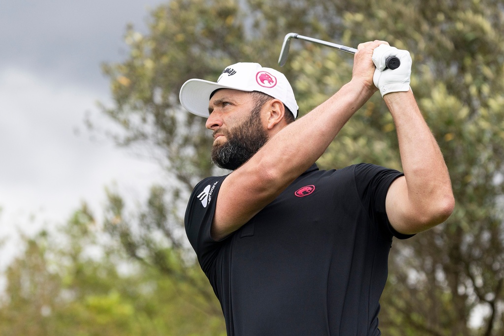 Captain Jon Rahm, of Legion XIII, hits shot from the third tee during the final round of LIV Golf South Africa at The Club at Steyn City, Sunday, March 22, 2026, in Midrand, South Africa. (LIV Golf via AP)