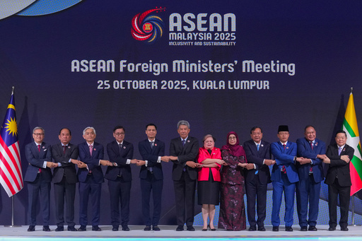 From left to right, Lao's Minister of Foreign Affairs Thongsavanh Phomvihane, Myanmar's Permanent Secretary of the Ministry of Foreign Affairs U Hau Khan Sum, Singapore's Permanent Secretary of Foreign Affairs Albert Chu, Thailand's Foreign Minister Sihasak Phuangketkeow, Vietnam's Deputy Minister of Foreign Affairs Dang Hoang Giang, Malaysia's Foreign Minister Mohamad Hasan, Philippine Foreign Secretary Theresa Lazaro, unidentified Brunei's representative, Cambodia's Foreign Minister Prak Sokhonn, Indonesia's Foreign Minister Sugiono, East Timor's Foreign Minister Bendito dos Santos Freitas and ASEAN Secretary-General Kao Kim Hourn pose for a group photo during ASEAN foreign ministers' meeting at the Kuala Lumpur Convention Centre in Kuala Lumpur, Malaysia, Saturday, Oct. 25, 2025. (AP Photo/Rafiq Maqbool) From left to right, Lao's Minister of Foreign Affairs Thongsavanh Phomvihane, Myanmar's Permanent Secretary of the Ministry of Foreign Affairs U Hau Khan Sum, Singapore's Permanent Secretary of Foreign Affairs Albert Chu, Thailand's Foreign Minister Sihasak Phuangketkeow, Vietnam's Deputy Minister of Foreign Affairs Dang Hoang Giang, Malaysia's Foreign Minister Mohamad Hasan, Philippine Foreign Secretary Theresa Lazaro, unidentified Brunei's representative, Cambodia's Foreign Minister Prak Sokhonn, Indonesia's Foreign Minister Sugiono, East Timor's Foreign Minister Bendito dos Santos Freitas and ASEAN Secretary-General Kao Kim Hourn pose for a group photo during ASEAN foreign ministers' meeting at the Kuala Lumpur Convention Centre in Kuala Lumpur, Malaysia, Saturday, Oct. 25, 2025. (AP Photo/Rafiq Maqbool)