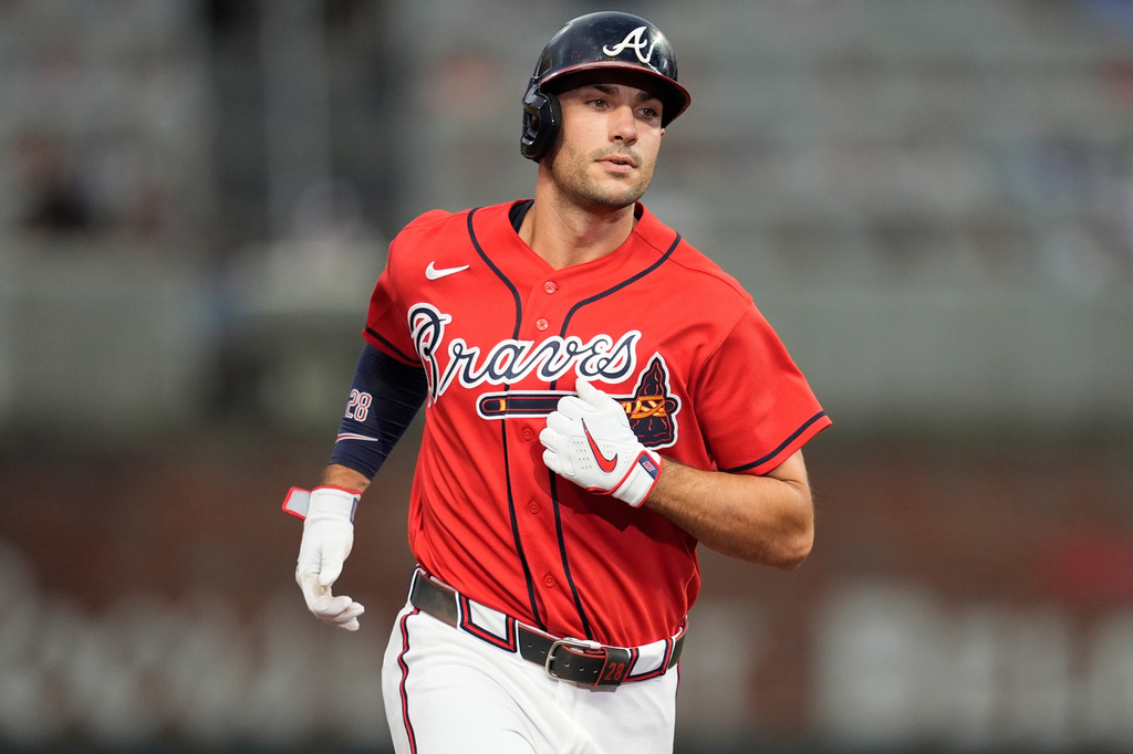 Atlanta Braves' Matt Olson (28) celebrates hitting a solo homerun in the fourth inning of a baseball game against the Texas Rangers, Friday, July 17, 2026, in Atlanta. (AP Photo/Mike Stewart)