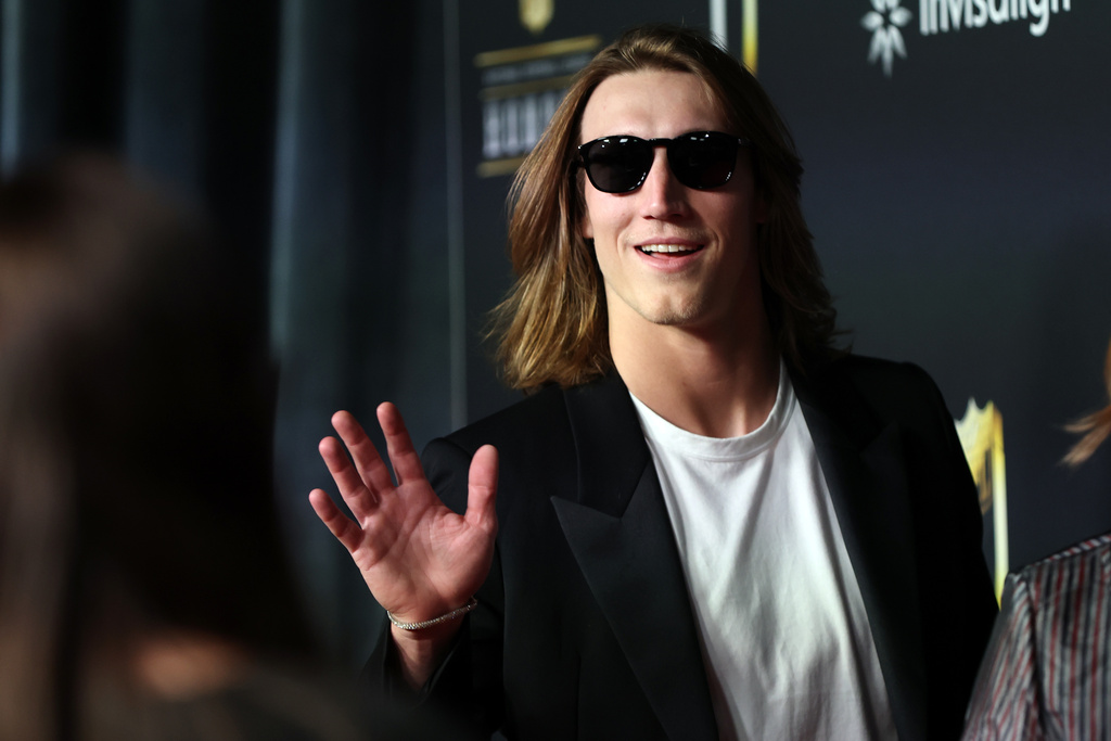 Jacksonville Jaguars' Trevor Lawrence waves during the NFL Honors' red carpet at Palace of Fine Arts, Thursday, Feb. 5, 2026, in San Francisco. (Scott Strazzante/San Francisco Chronicle via AP)