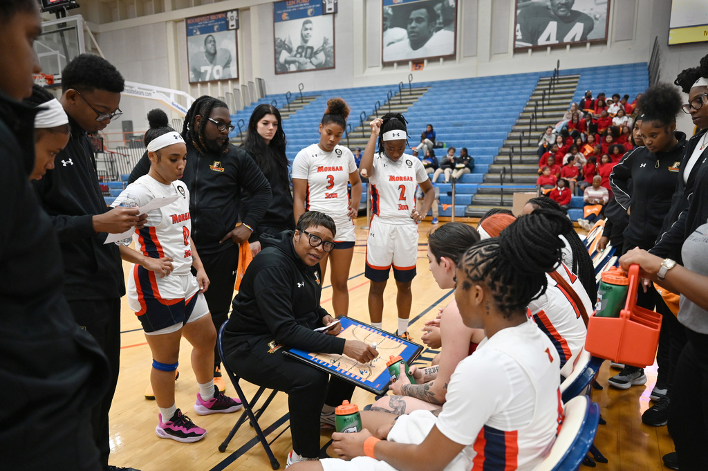 Morgan State head coach Nadine Domond instructs her team during a timeout in an NCAA college basketball game Wednesday, Nov. 12, 2025, in Baltimore. (AP Photo/Gail Burton)