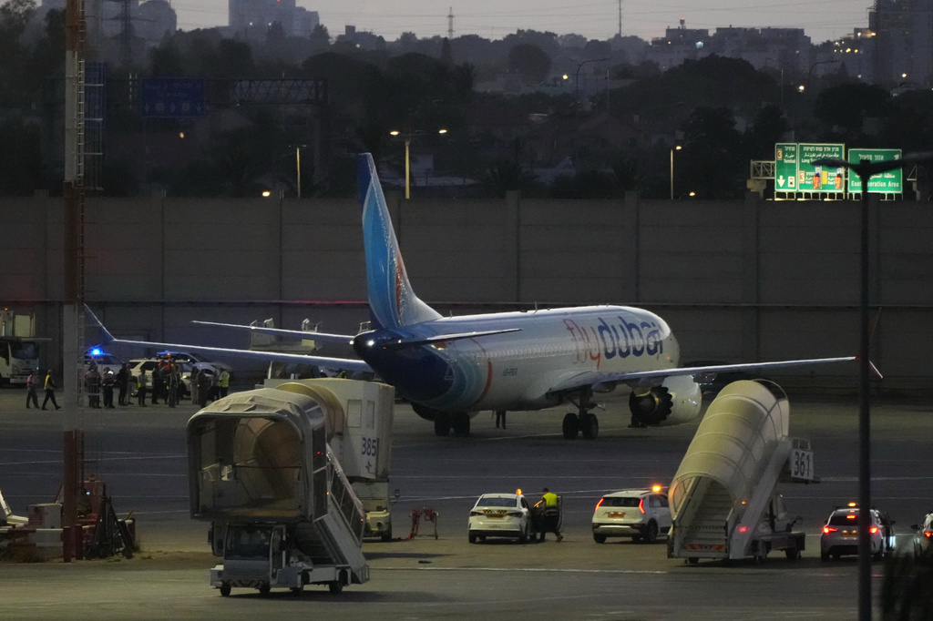 A FlyDubai aircraft carrying Israelis who experienced an emergency landing in Saudi Arabia is seen parked at Ben Gurion International Airport, near Tel Aviv, Israel, Wednesday, Sept. 30, 2026. (AP Photo/Ariel Schalit)