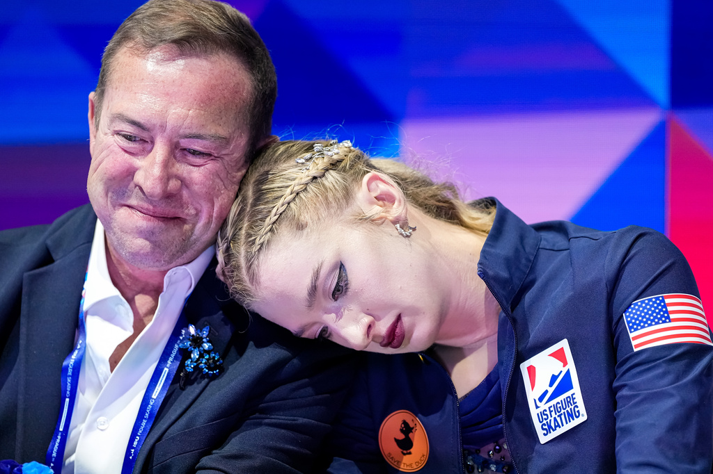 Amber Glenn from the United States reacts at the end of her routine during the women free skating at the Figure Skating World Championships in Prague, Czech Republic, Friday, March 27, 2026. (AP Photo/Petr David Josek)
