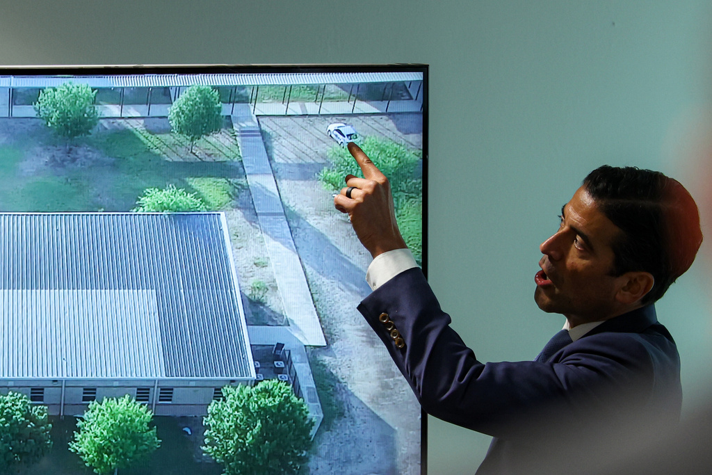Defense attorney Nico LaHood points to a map of the exterior of Robb Elementary School to show where his client, Adrian Gonzales, parked while cross-examining witness Joe Vasquez, a Zavala County Sheriff's Office deputy, during Gonzales's trial at the Nueces County Courthouse, Tuesday, Jan. 13, 2026, in Corpus Christi, Texas. (Sam Owens/The San Antonio Express-News via AP, Pool)