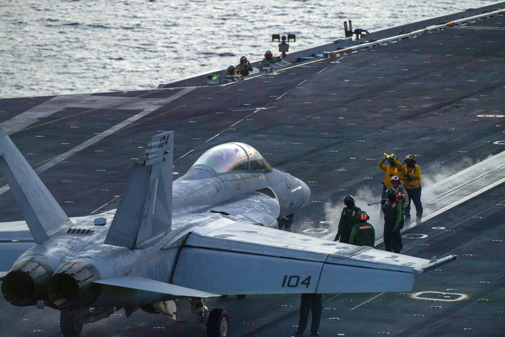 Sean Rima US sends ship-based Navy fighter jets to a base in the Middle East to ...
