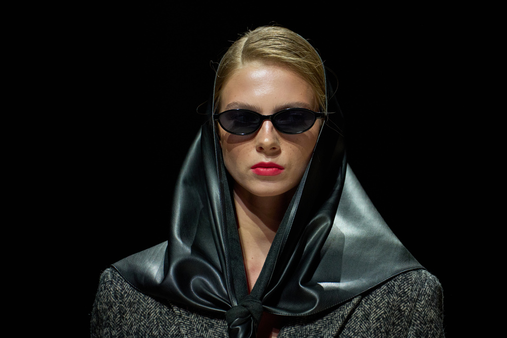 A model wears a creation by Russian brand Edder on a runway at the Moscow Fashion Week in Moscow, Sunday, March 15, 2026. (AP Photo/Alexander Zemlianichenko)