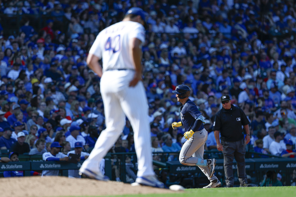 Tampa Bay Rays pinch hiter Nick Fortes rounds the bases after hitting a solo home run against the Chicago Cubs during the ninth inning of a baseball game Saturday, Sept. 13, 2025, in Chicago. (AP Photo/Kamil Krzaczynski)