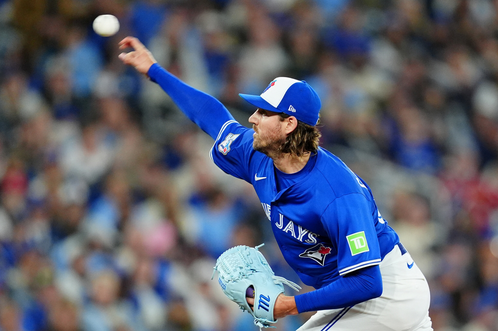 Toronto Blue Jays pitcher Kevin Gausman works against the Tampa Bay Rays during first-inning baseball game action in Toronto, Monday, May 11, 2026. (Frank Gunn/The Canadian Press via AP)