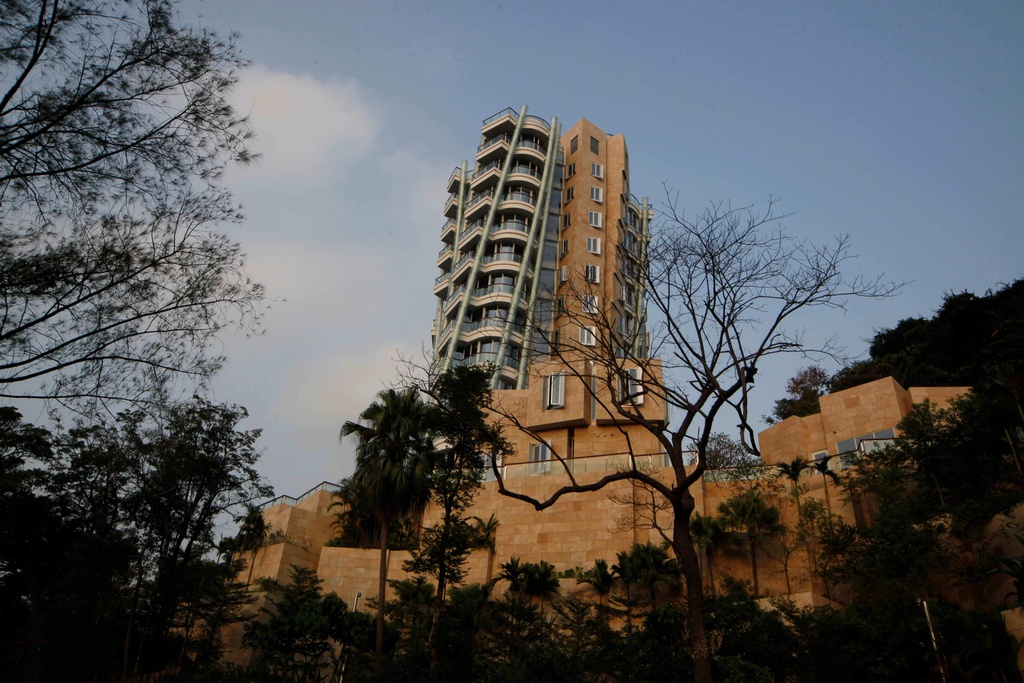 FILE - The luxury residential building "Opus Hong Kong," designed by Frank Gehry, stands in Mid-Levels East of Hong Kong, Nov. 13, 2012. (AP Photo/Kin Cheung, File)