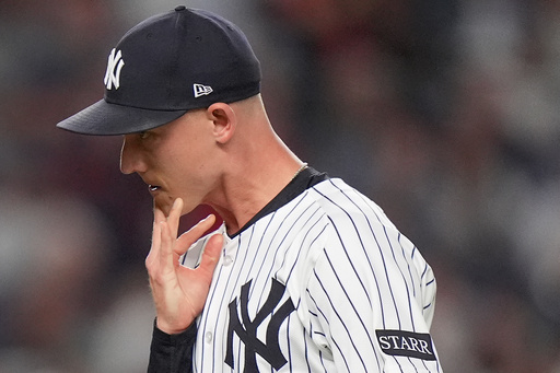 New York Yankees pitcher Luke Weaver reacts as he walks off the field after giving up two runs to the Boston Red Sox during the seventh inning of Game 1 of an American League wild-card baseball playoff series, Tuesday, Sept. 30, 2025, in New York. (AP Photo/Frank Franklin II) New York Yankees pitcher Luke Weaver reacts as he walks off the field after giving up two runs to the Boston Red Sox during the seventh inning of Game 1 of an American League wild-card baseball playoff series, Tuesday, Sept. 30, 2025, in New York. (AP Photo/Frank Franklin II)