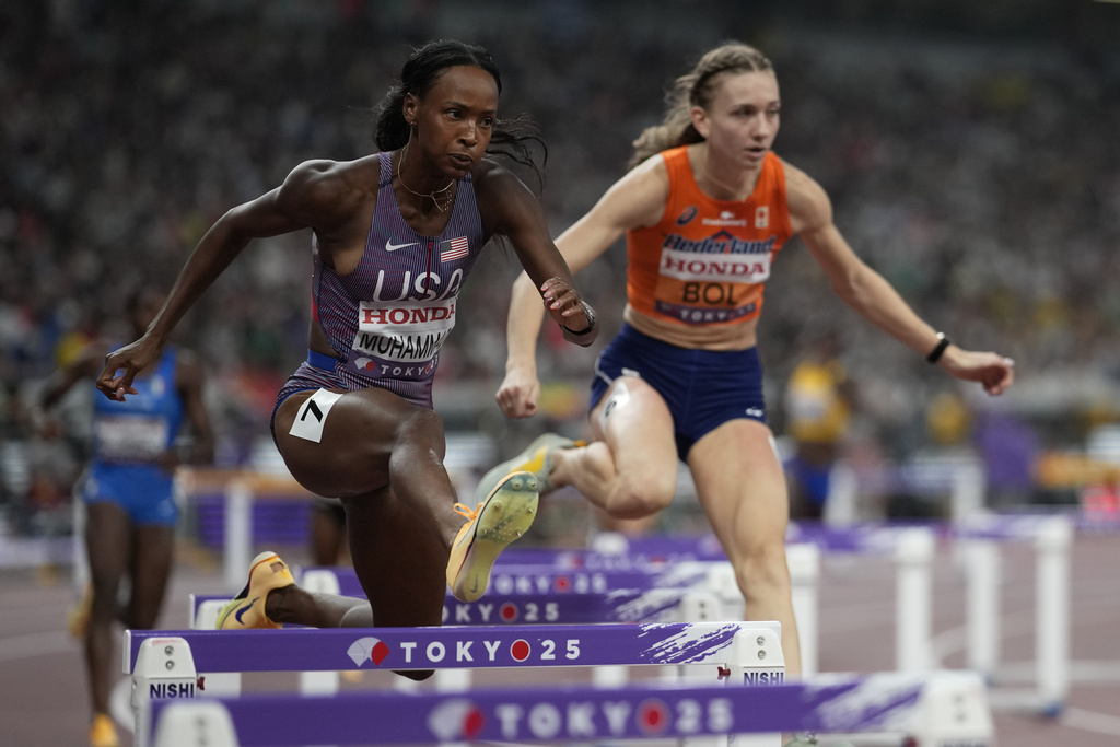 United States' Dalilah Muhammad competes in the women's 400 meters hurdles heats at the World Athletics Championships in Tokyo, Wednesday, Sept. 17, 2025. (AP Photo/Louise Delmotte)