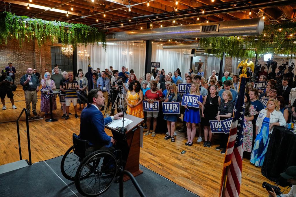Iowa state Rep. Josh Turek speaks during a primary election night watch party after winning the Democratic nomination for U.S. Senate, Tuesday, June 2, 2026, in Des Moines, Iowa. (AP Photo/Bryon Houlgrave)
