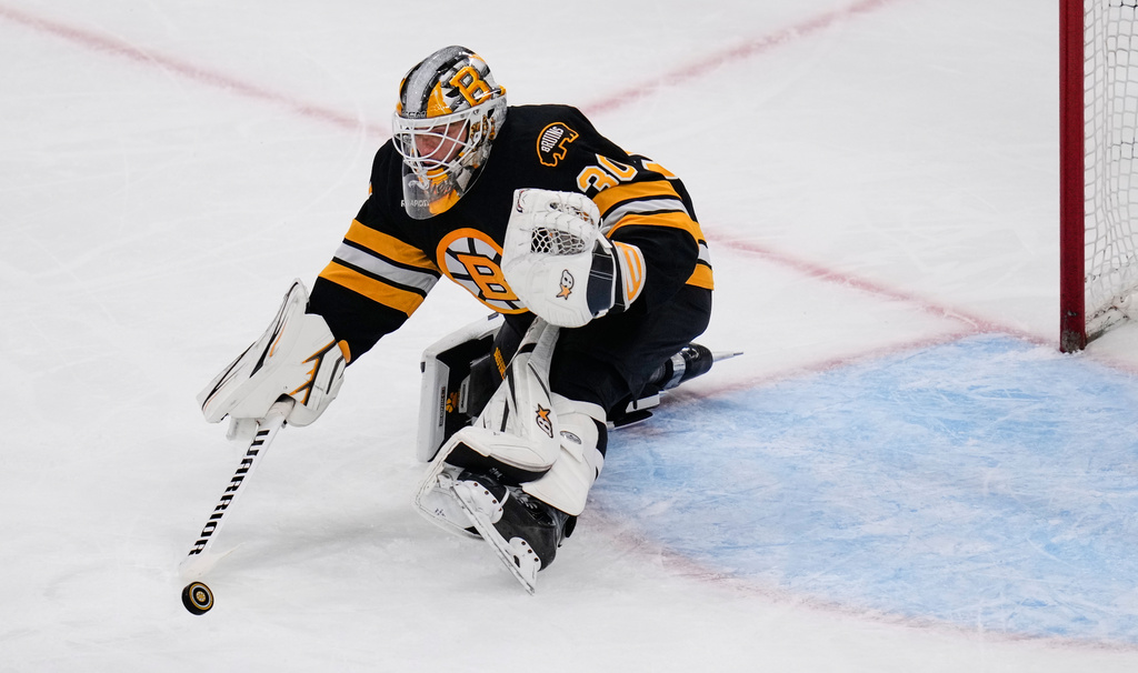 Boston Bruins goalie Michael DiPietro makes a save during the second period of an NHL hockey game against the Nashville Predators, Thursday, Oct. 22, 2026, in Boston. (AP Photo/Charles Krupa)