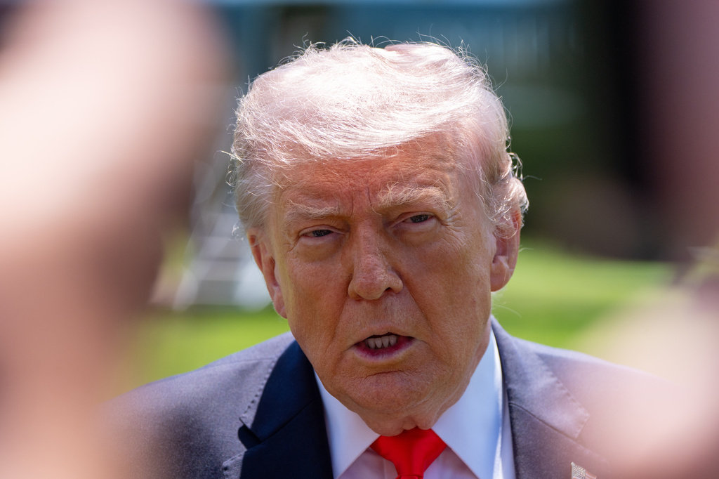 President Donald Trump speaks with reporters before departing on Marine One from the South Lawn of the White House, Friday, May 1, 2026, in Washington. (AP Photo/Alex Brandon)