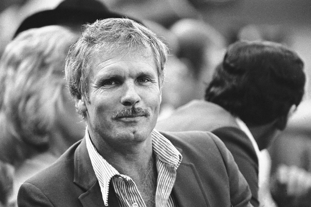 FILE - Atlanta Braves owner Ted Turner watches his team in action against the St. Louis Cardinals during the first National League Championship game, Oct. 6, 1982, St. Louis. (AP Photo/Rusty Kennedy, File)
