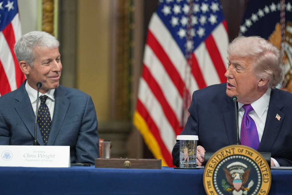 President Donald Trump looks at Energy Secretary Chris Wright as he speaks during an event about the Ratepayer Protection Pledge, in the Indian Treaty Room of the Eisenhower Executive Office Building on the White House complex, Wednesday, March 4, 2026, in Washington. (AP Photo/Jacquelyn Martin)