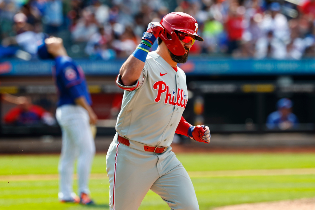 Philadelphia Phillies' Kyle Schwarber reacts after hitting a two-run home run off New York Mets pitcher Kodai Senga during the seventh inning of a baseball game, Sunday, June 28, 2026, in New York. (AP Photo/Noah K. Murray)