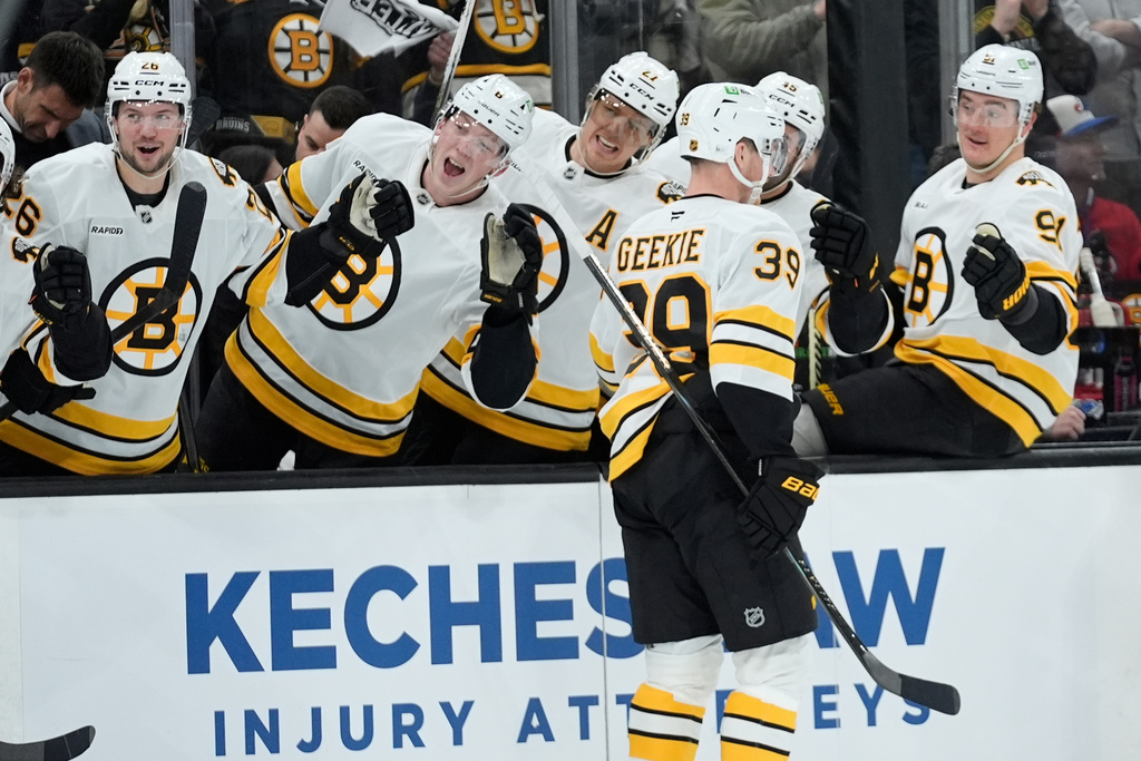 Boston Bruins center Morgan Geekie (39) celebrates his second period goal against the Montreal Canadiens in an NHL hockey game in Boston, Saturday, Jan. 24, 2026. (AP Photo/Robert F. Bukaty)