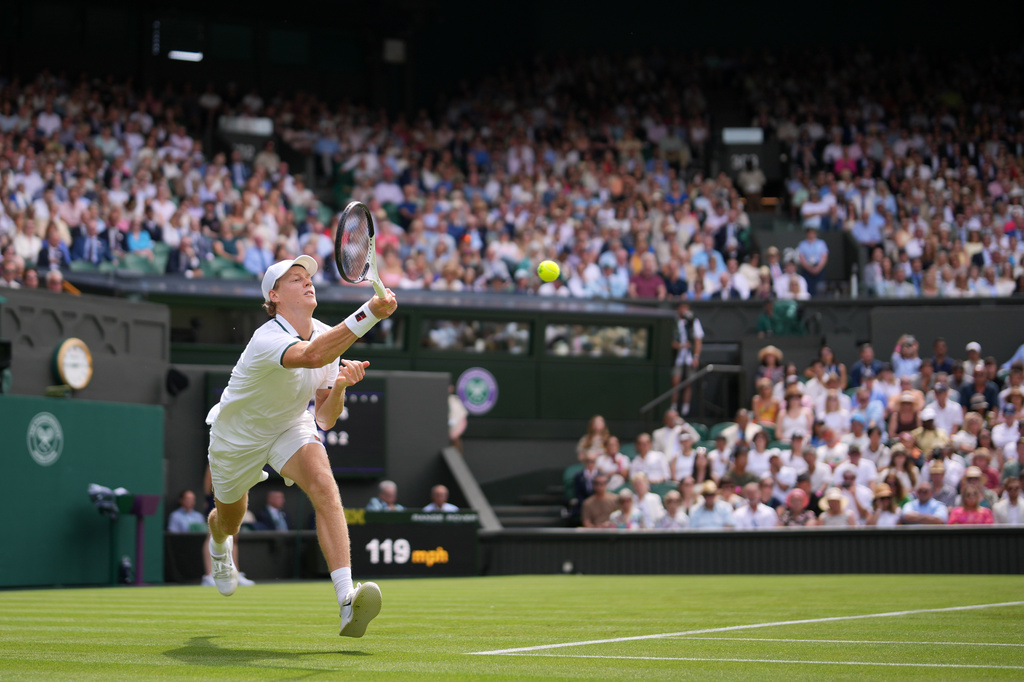 Jannik Sinner of Italy returns the ball to Miomir Kecmanovic of Serbia during the men's singles match at the Wimbledon Tennis Championships in London, Monday, June 29, 2026.(AP Photo/Kin Cheung)