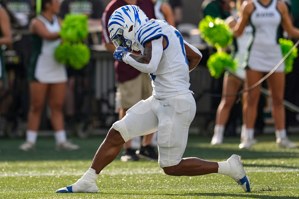 Memphis running back Greg Desrosiers Jr. (13) scores a touchdown against UAB during the first half of an NCAA college football game, Saturday, Oct. 18, 2025, in Birmingham, Ala. (AP Photo/Mike Stewart)