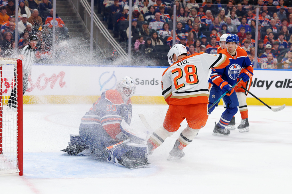 Anaheim Ducks' Jeffrey Viel (28) stops in front of Edmonton Oilers goalie Connor Ingram (39) during the first period of an NHL game, Saturday March 28, 2026, in Edmonton, Alberta. (James Maclennan/The Canadian Press via AP)
