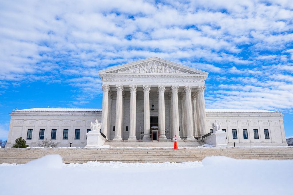The U.S. Supreme Court is photographed after a snowstorm Monday, Jan. 26, 2026, in Washington. (AP Photo/Mariam Zuhaib)