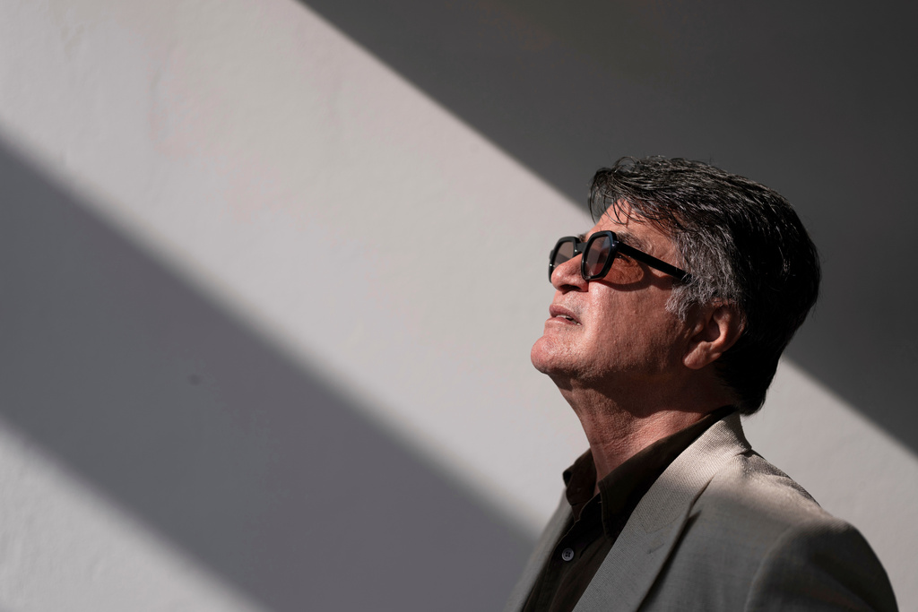 FILE - Director Jafar Panahi poses for a portrait photograph for the film "It Was Just an Accident" at the 78th international film festival, Cannes, southern France, on May 21, 2025. (Photo by Scott A Garfitt/Invision/AP, File)
