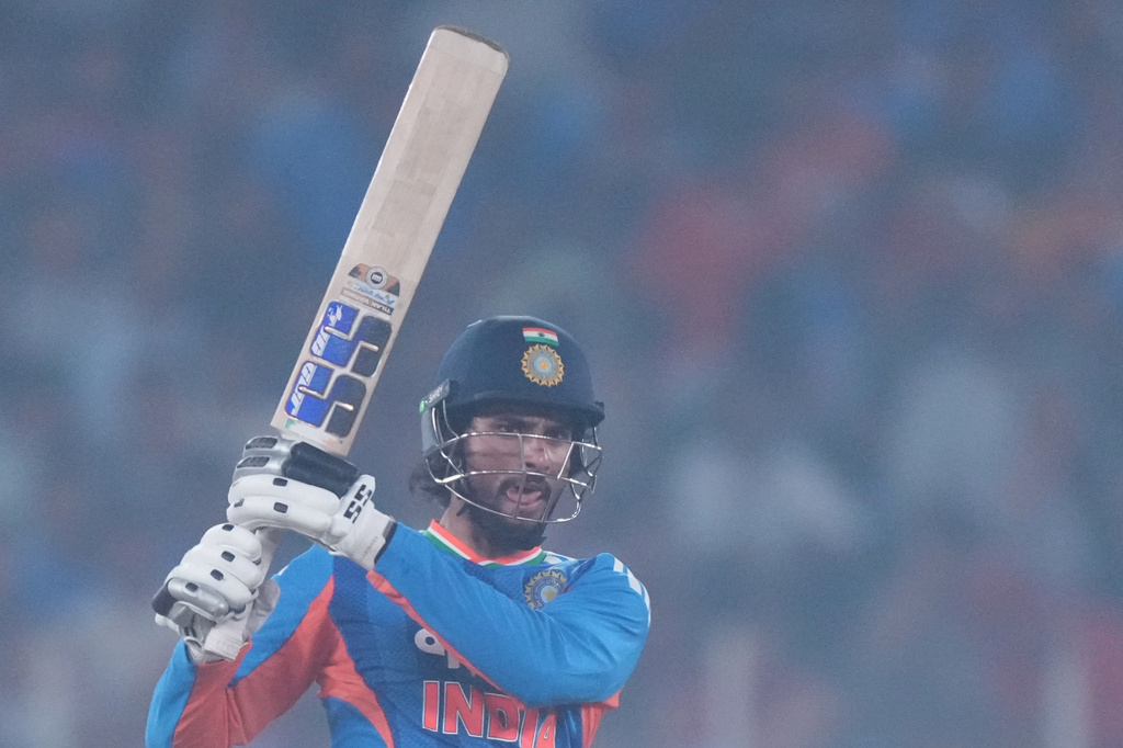 India's Tilak Varma plays a shot during the fifth T20 cricket match between India and South Africa in Ahmedabad, India, Friday, Dec. 19, 2025. (AP Photo/Ajit Solanki)