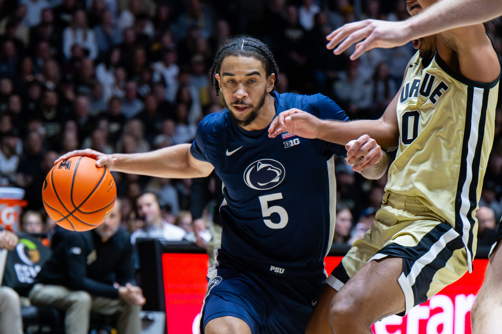 Penn State guard Freddie Dilione V. (5) drives toward the basket during the first half of an NCAA college basketball game against Purdue, Saturday, Jan. 10, 2026, in West Lafayette, Ind. (AP Photo/Doug McSchooler)